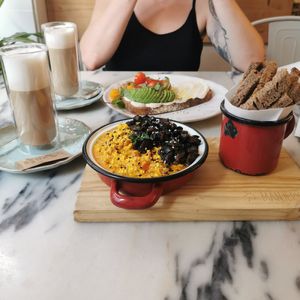 mexidas de tofu com tomatada & Tosta queijo de caju com tomate cherry e abacate at Manjerica in Lisbon