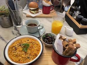 Tofu scramble with a side of sautéed mushrooms and the Portugal burger with sweet potato crisps  at Manjerica in Lisbon