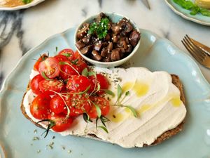 Cashew cheese on toast with sauteed mushrooms at Manjerica in Lisbon