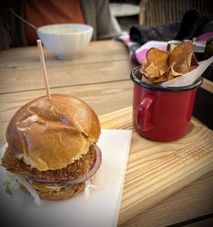Delicious burger with sweet potato chips  at Manjerica in Lisbon