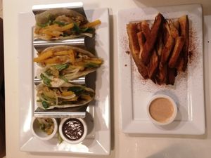 Yucas bravas and vegetable tacos at Lo De Monik in Havana