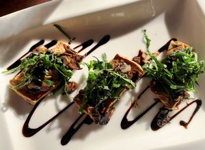 Mushroom bruschetta with crust made from tofu  at Qulture in Puerto Vallarta
