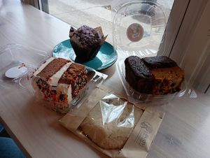 Ube muffin, confetti cake, chocolate chip cookie, and brownie box at Mindful Baking Kitchen & Cafe in Chicago