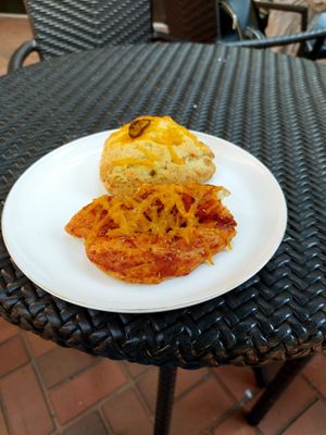 Pizza and Jalapeño cheddar scone. at Bonus Bakery in Vancouver