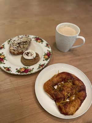Almond croissant (with filling), pumpkin spice cookie, pizza pretzel & soy latte   at Bonus Bakery in Vancouver