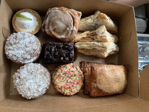 Coffee cake, key time pie, rainbow sprinkle cookies, PB Chocolate Death Bar, cinnamon roll, guava hand pies, feta & spinach everything turnovers  at Valhalla Bakery in St Petersburg