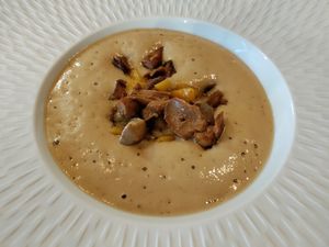 Porcini mushrooms and peach on foam at Antonio Chiodi Latini in Turin