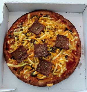 Vegan bacon, mushroom, jalapeno, & pineapple pizza at Stenovn Delicato Pizza & Sharwarma in Odense