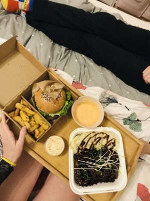 burger with fries, coleslaw, vegan duck with cabbage at Vegan Pub in Bratislava