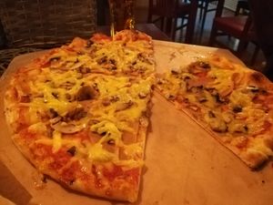 Salami pizza with mushrooms  at Vegan Pub in Bratislava