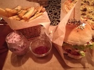 California Burger with fries and beetroot salad  at Vegan Pub in Bratislava