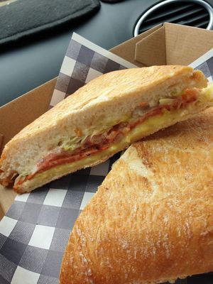 Vegan ham, cheese, tomato and lettuce toastie at Little Mylkbar in Parkville