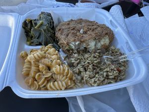 Platter: collard greens, cauliflower steak, dirty rice, mac n cheese   at Soul Food Vegan in Houston