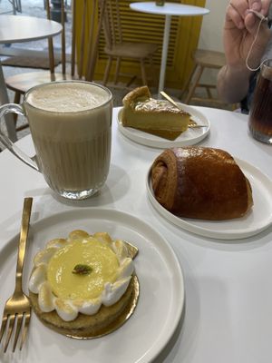 Lemon curd, flan & pain Au chocolate. Soy latte on the side!   at Instant V in Aix-en Provence