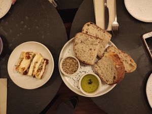 Halumi Cheese (not vegan) home made bread at Nola Kitchen in Porto