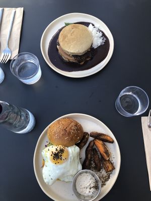Blueberry pancakes and Eggs & Brioche  at Nola Kitchen in Porto