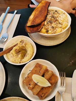Hummus, crispy tofu and vegan cauliflower cheese at Nola Kitchen in Porto