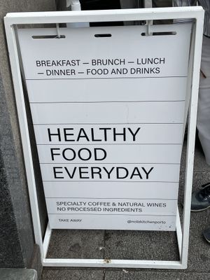 Sign by the door   at Nola Kitchen in Porto