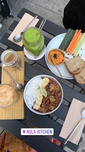 Açai bowls, latte with soya milk, paprika hummus  at Nola Kitchen in Porto