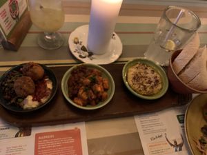 Tapas- houmous, falafel & grains, black beans & sweet potato + ciabatta   at Lounges - Granello Lounge in Hitchin