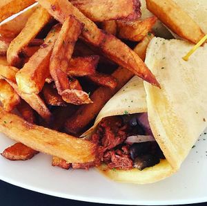 Jackfruit wrap and fries at Super Natural Vegan Cuisine in Lindsay