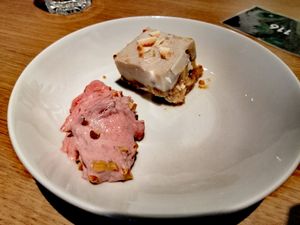 Coconut banana pie and plum dessert with red wine at Tibits in Darmstadt