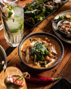 BURMESE CHICKPEA CURRY 
Braised chickpeas and potatoes in burmese spices with pickled mustard greens at Rice Paper Scissors in Melbourne