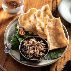 THAI MUSHROOM RELISH Caramelised asian mushrooms with white pepper, chilli and soy bean crackers
 at Rice Paper Scissors in Melbourne