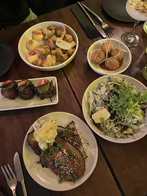 Cauliflower bites, aranchini, caesar salad, miso eggplant, onion bhajias   at You Came Again in West End