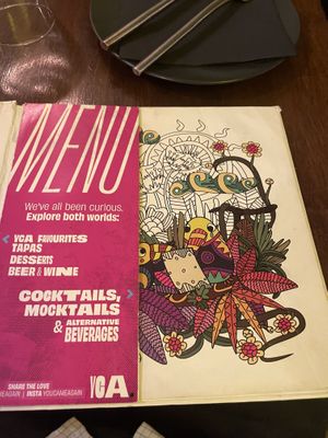 The book with the menu pasted inside  at You Came Again in West End