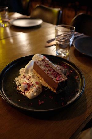 Chocolate cake with marshmallow whipped cream at You Came Again in West End