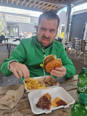 My non vegan boyfriend tucking into the BBQ burger. He scoffed the lot. I think that says it all 😊 at Dirty Kitch in Coventry