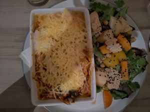 Creamy veg lasagna with parsnip and carrot side salad. at The Alleycat in Inverness