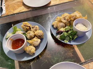 Haggis bon bons and buttered mushrooms.  at The Alleycat in Inverness