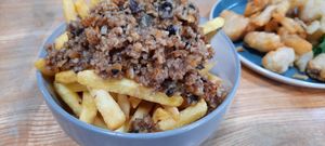Ĺoaded fries with haggis at The Alleycat in Inverness