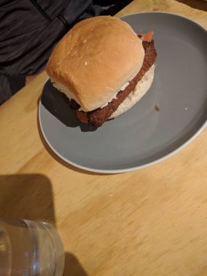 Breakfast roll with bacon and sausage at The Alleycat in Inverness