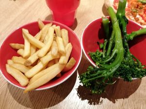 Fries and garlic broccolini at Frankie & Benny's - Meadowhall in Sheffield