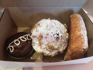 Hostess cup cake, blueberry muffin, and chocolate croissant at Miss Chickpea's Bakeshop in San Antonio
