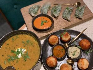 Red lentil Dahl, paniyaram and momos at Veda Café & Bar in Hong Kong Island