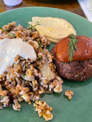 Glorious grains salad with tahini mustard dressing, Korean bbq burger and a side of hummus at Vegabond - West in Amsterdam