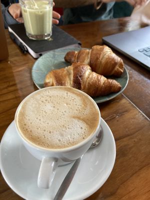 A cappuccino with some vegan croissants  at Vegabond - West in Amsterdam