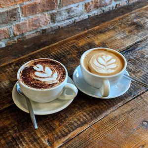 Beautiful soy cappuccino & flat white date  at The Drop Off in Bury