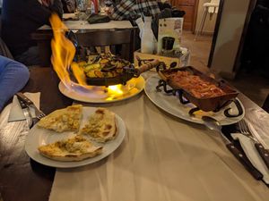 Vegan tofu garlic bread, flaming vegetable sach and traditional Bulgarian bochurmoz at 4Directions in Bansko
