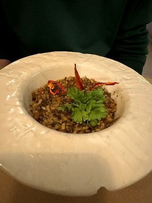 Risotto de funghi porcini, setas shiitake y verduras variadas con aceite de trufa. (Arroz integral) at La Casa Viva in Valencia