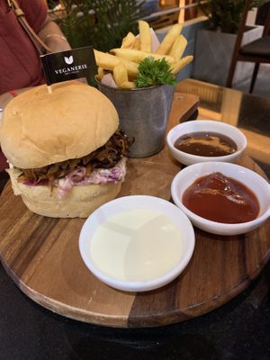 Puller Pork Burger and Fries with sauces/ketchup at Veganerie - Silom in Bangkok