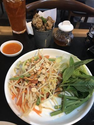 Som tam with fried nuggets at Veganerie - Silom in Bangkok