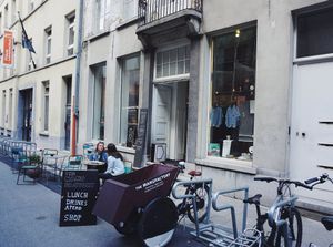 Storefront and front terrace at The Manufactory in Ghent