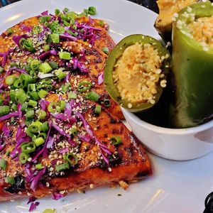 Birria (style) Jackfruit Tacos 
Corn tortillas, braised jackfruit, rstd red pepper cashew cheese, red onions, avocado,
all dipped then grilled in chipotle-garlic mushroom consome at Daily Fuel in Portland