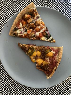 Top one is Buffalo chicken, bottom is Georgia peach!  at Plant Based Pizzeria in Atlanta