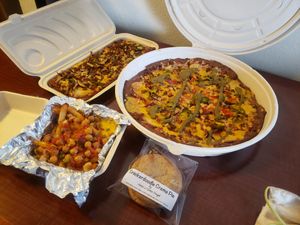 Chilli cheese fries, taco pizza, Philly cheese steak Flatbread and snickeedoodle creme pie at Plant Based Pizzeria in Atlanta